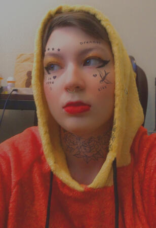 The Body w/ makeup and Pooh onesie on